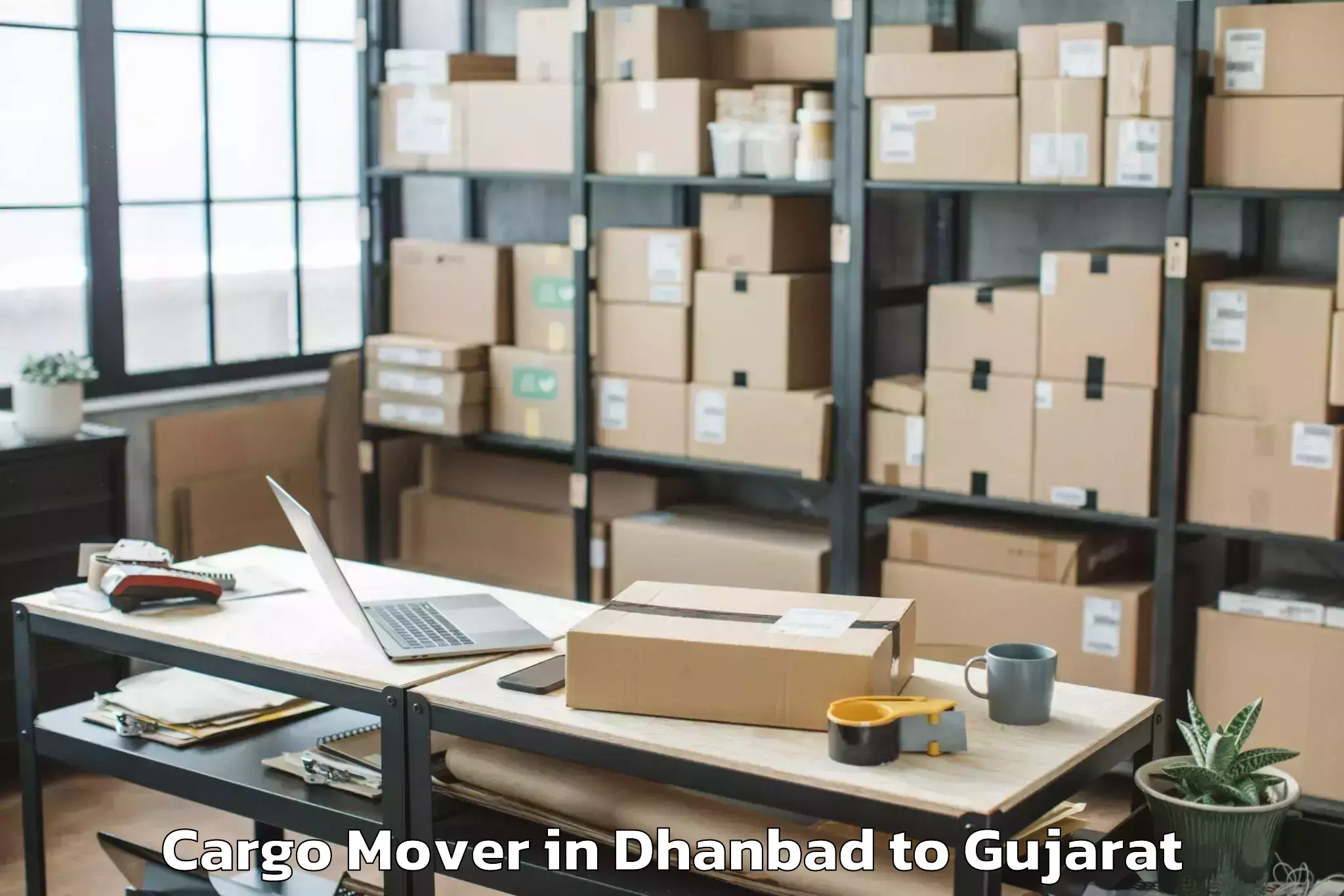 Reliable Dhanbad to Shree Somnath Sanskrit Univers Cargo Mover